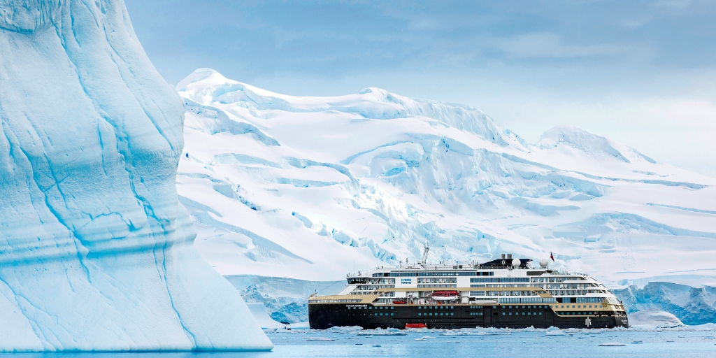 ship sailing through Antarctica