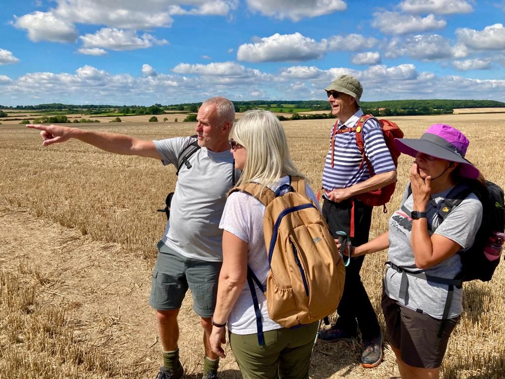Group of people in corn field