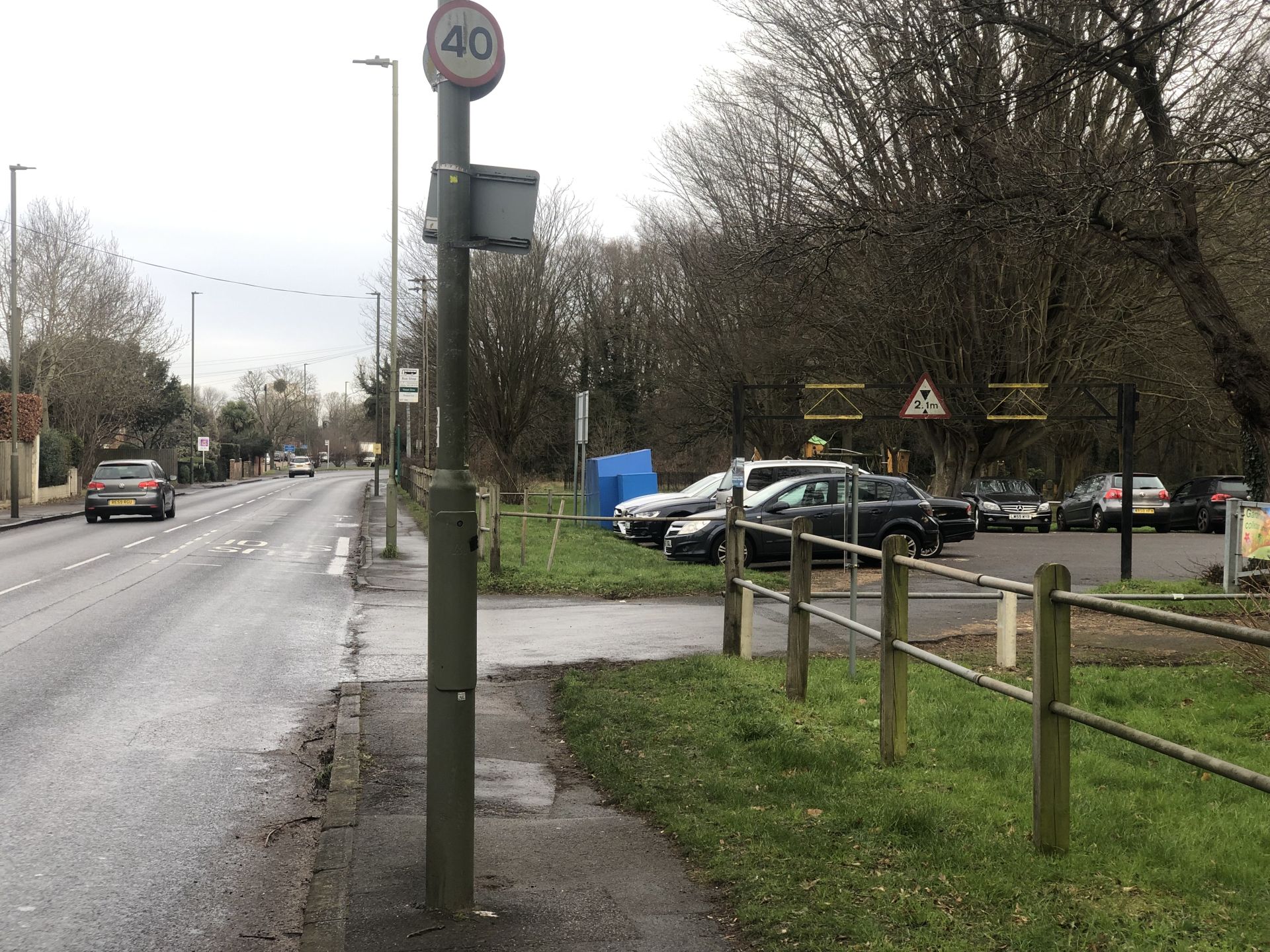 The additional parking is top left of photo behind the bus stop 