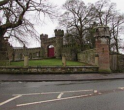View from the roadside of the castellated entrance to Hawarden Park, Hawarden by Jaggery