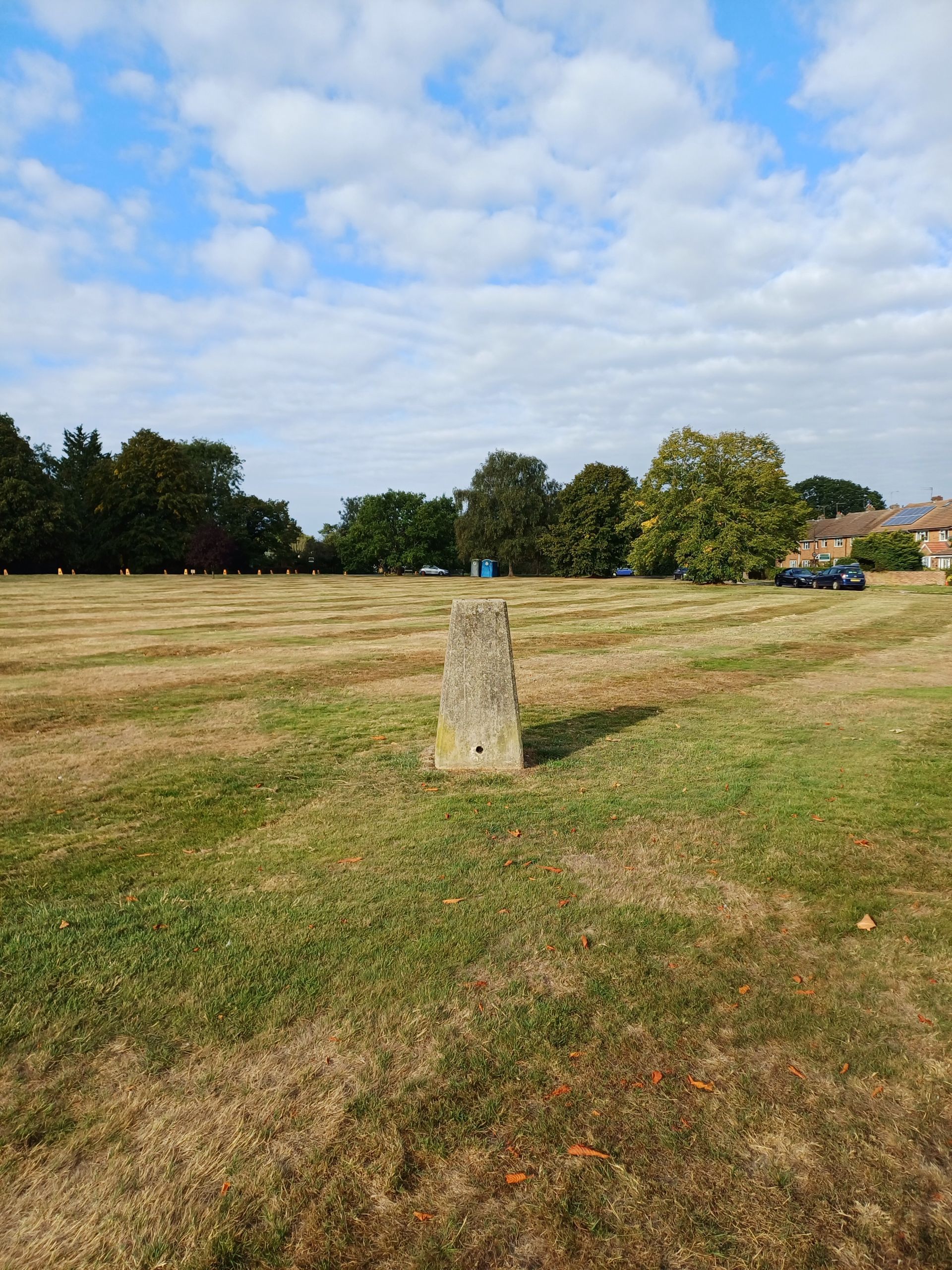 Trig point on a village green