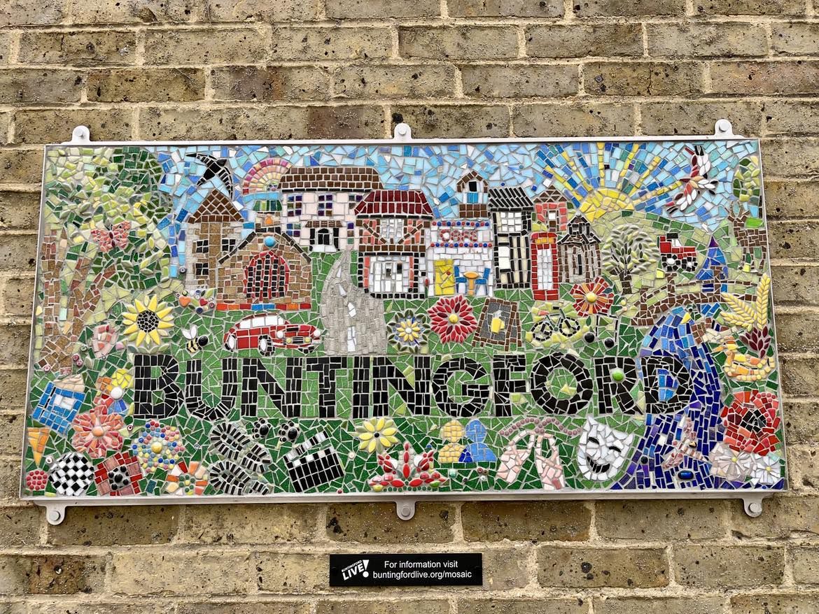 A colourful Buntingford village sign