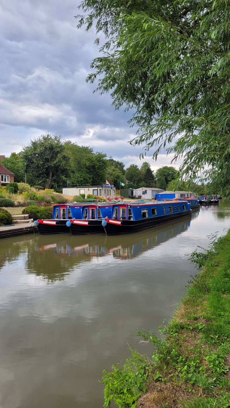 Three narrowboats on the canal