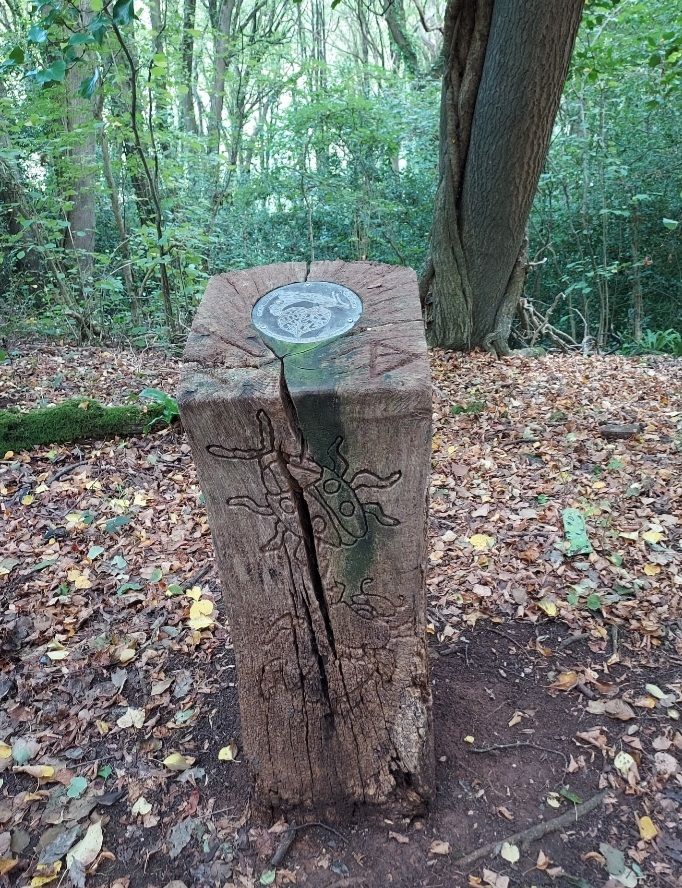 Ingraved wooden post
