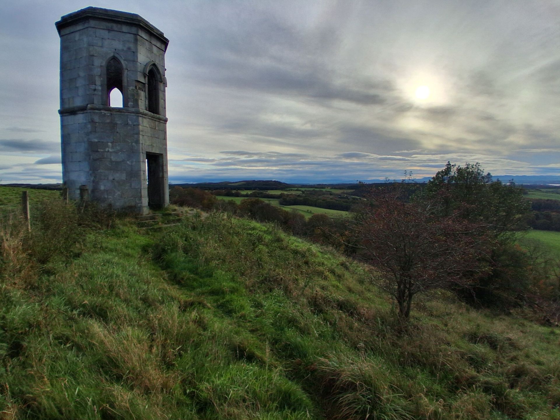 The Victorian (built 1842) 7 metre (24 feet) high Bandrum Temple Folly a lookout Tower that  stands on the Bandrum Southern escarpment  with expansive views over the River Forth & Lothian Shores.