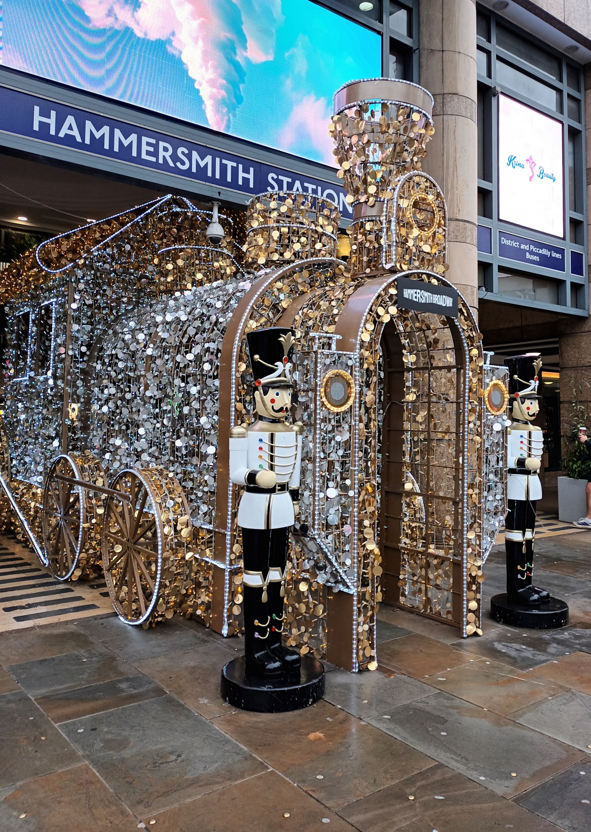 Christmas decorations at entrance to Hammersmith underground station