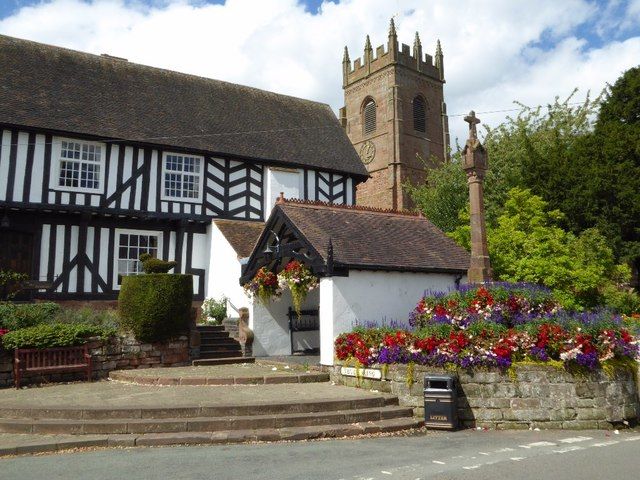 he Vicarage, lychgate, church tower andcross in Claverley taken 8 years ago, near to Claverley, Shropshire, England