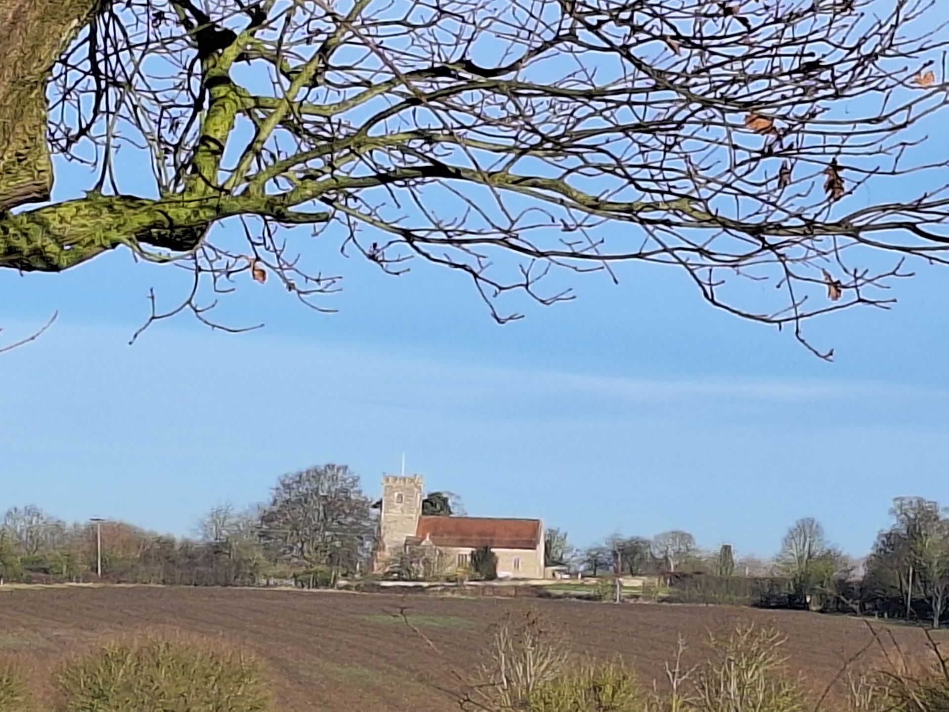 Creeting St Mary Church across the hill