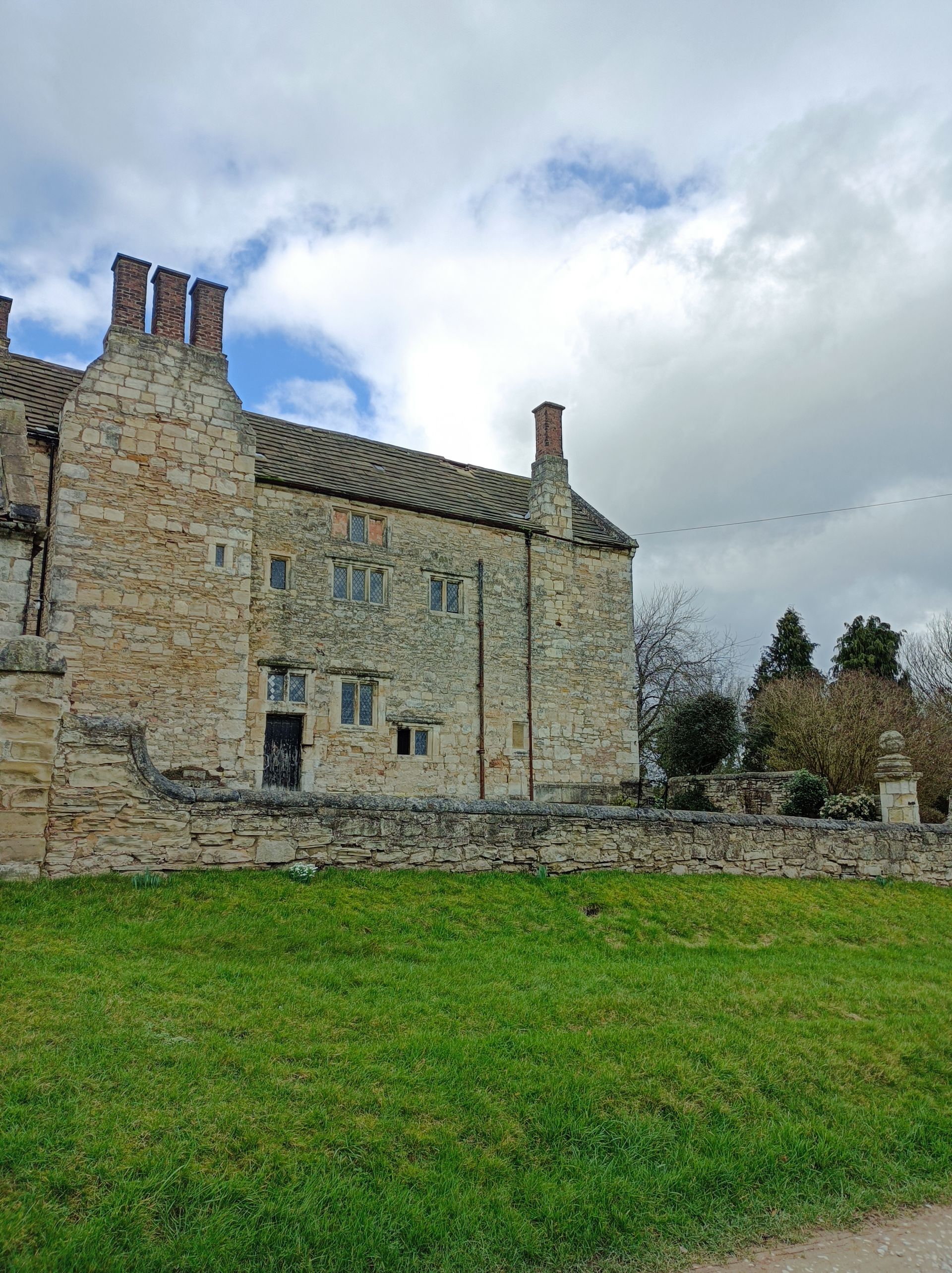 Huddleston Hall: 16th C farmhouse with earlier outbuildings.
