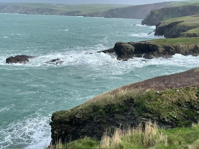 Waves breaking against Castle Rock, Port Gaverne