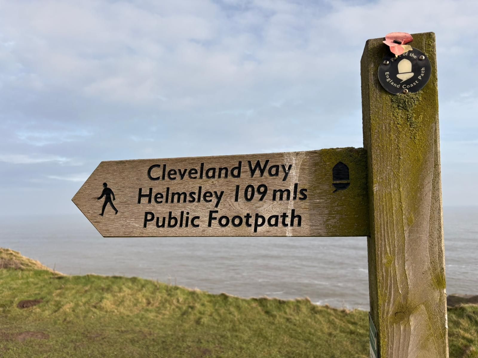Footpath sign for the Cleveland Way, showing 109 miles to Helmsley