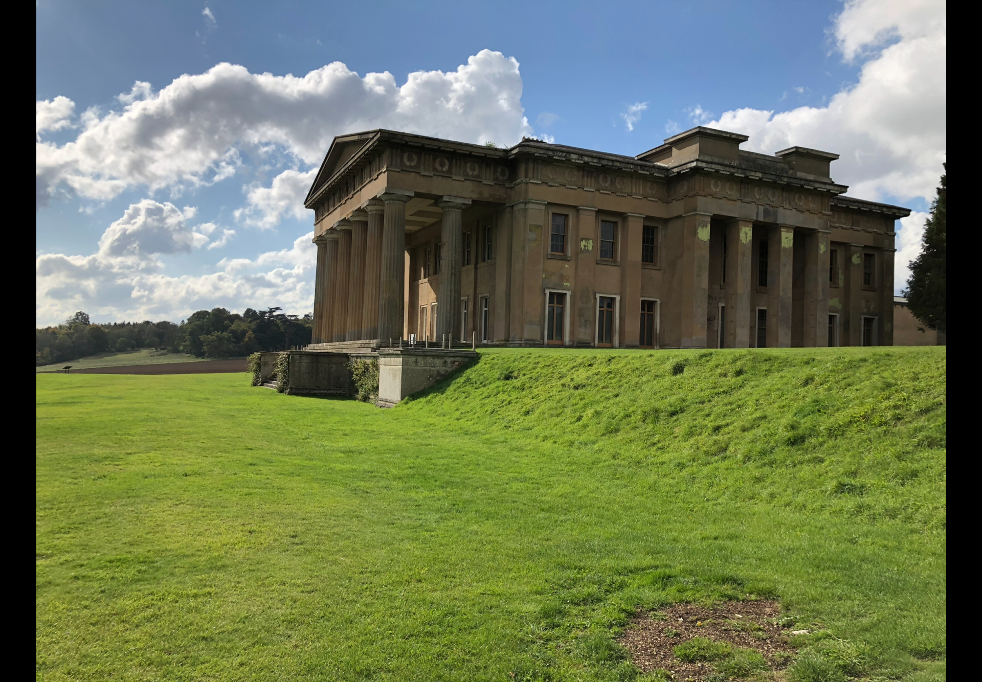 Northington Grange. The shell of a ruined great house sits on a grassy mound.