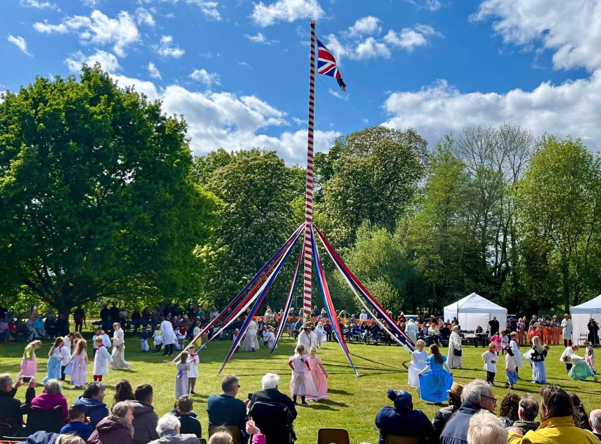 A maypole and dancers