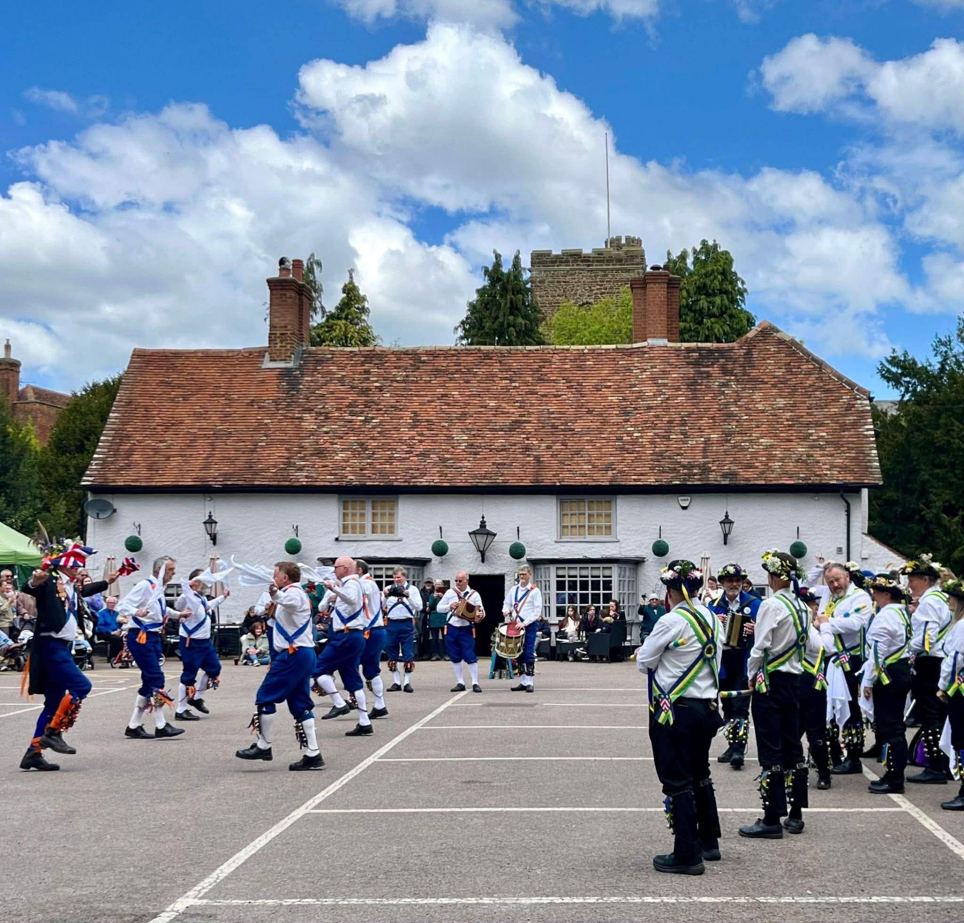 Morris dancers outside a pub