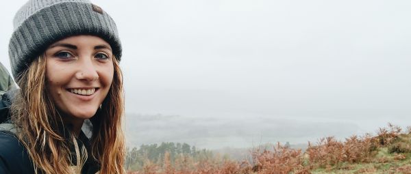 A young woman by the coast