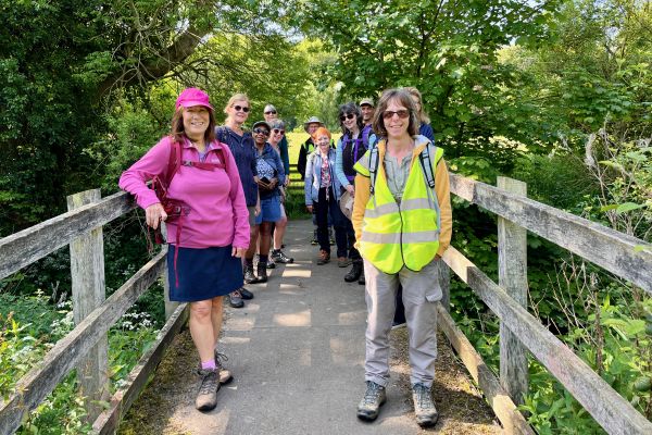 A group of ramblers on a bridge