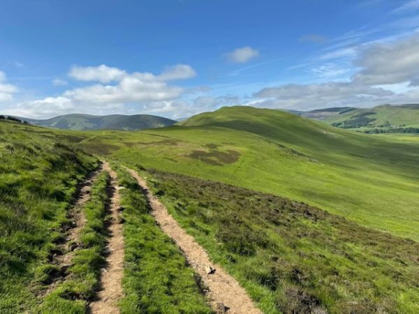 heading uphill to Cademuir Forts