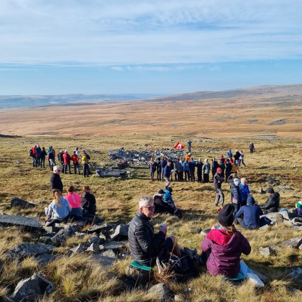 A group of walkers gathered at the Wellington crash site on Carreg Goch 