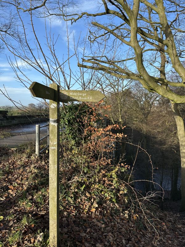 Signpost, along the route.