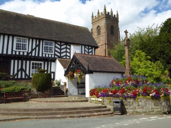 he Vicarage, lychgate, church tower andcross in Claverley taken 8 years ago, near to Claverley, Shropshire, England
