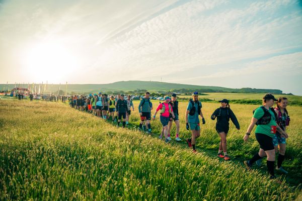 Photo of a large group of people walking the Lake District Ultra Challenge