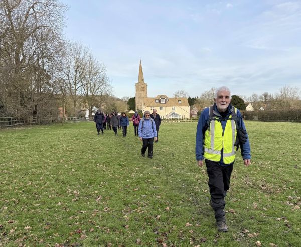 Walking through the countryside near a church