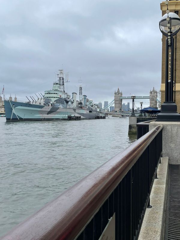 A view of the iconic cruiser HMS Belfast with Tower Bridge in the background