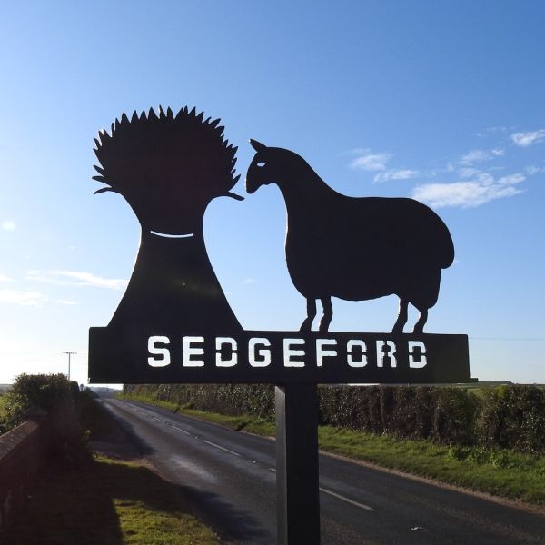 Sedgeford village sign.