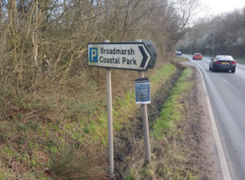 Signpost to car park