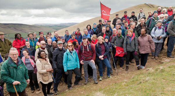 A large group of people upon a hill