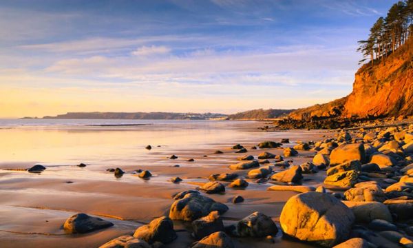 A red earth rocky coastline