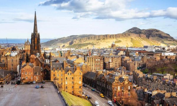 View across Edinburgh to a large hill