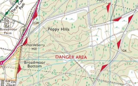 an Ordnance Survey Explorer map, with the boundary shown by solid red triangles