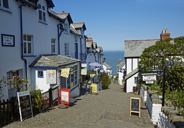 The steep, cobbled High Street of Clovelly gives way to a sea view