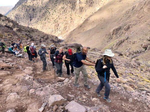 Helen and Amar at front of group in Morocco Toubkal