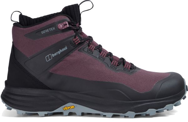 A mid-cut women’s hiking boot in dark wine red with black and grey panels, featuring GORE-TEX branding, durable fabric uppers, secure lace loops, and a rugged black-and-grey Vibram sole
