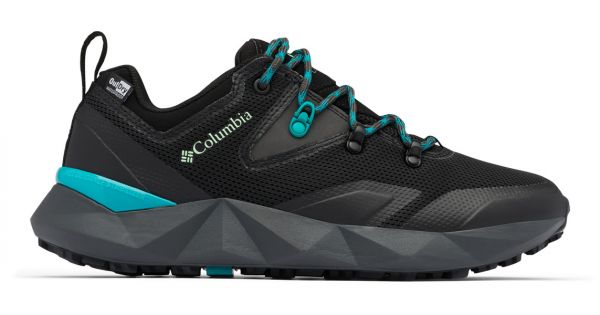 A close up of a single black walking shoe with a thick sole and light blue detailing on the laces