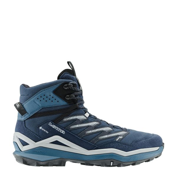 A mid‑cut women’s hiking boot in dark and light blue tones, featuring a breathable mesh and synthetic upper, GORE‑TEX lining, criss‑cross patterned laces, and a rugged, multi‑directional tread sole, branded ‘Lowa’ on the side